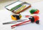 Ascuțitoare plastic dublă cu container și radieră buburuză Faber-Castell