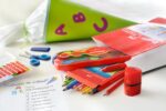 Ascuțitoare plastic triplă cu container grip 2001 roșie/albastră Faber-Castell