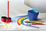 Ascuțitoare plastic triplă cu container grip 2001 roșie/albastră Faber-Castell